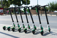 Lime Electric Push Kick Scooter Sharing Rentals In Sunny Day By In A Row Scooters By The Street On The Sidewalk In A City Thessaloniki Ready To Ride Or Rent