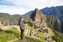 Traveller At The Lost City Of The Incas, Machu Picchu,Peru On Top Of The Mountain, With The View Panoramic