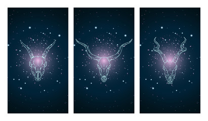 Wall Mural - Vector set of three illustrations with silhouettes skulls antelopes and goat on blue and pink starry sky background.