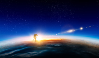 spaceman and planet, human in space concept