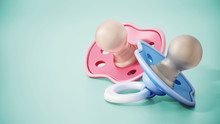 Pacifiers Standing On Green Background. 3D Illustration