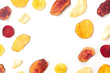 Dry Fruit And Vegetable Chips, Healthy Vegan Snack, On A White Background, Forming A Frame With Copy Space