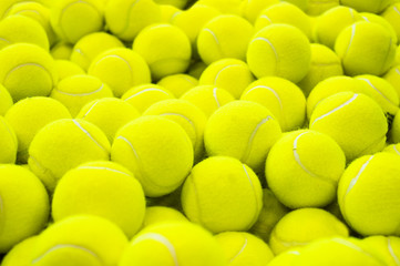 Lots of vibrant tennis balls, pattern of new tennis balls for background