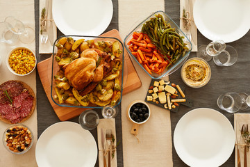 High angle view of roast turkey vegetables and other dishes are on the beautiful served table