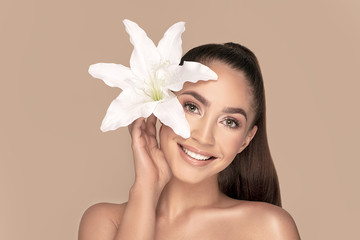pure beauty woman with white flower.