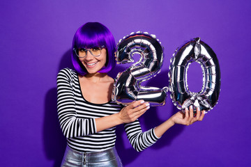 Poster - Photo of amazing lady hold hands ballons celebrate 20 year party wear specs striped pullover isolated purple background