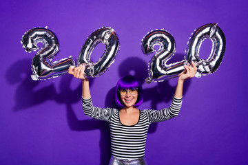 Poster - Photo of amazing lady hold hands ballons celebrate new 2020 year wear specs striped pullover isolated purple background