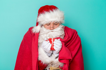 Sick Santa drinking hot tea