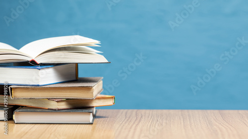 Cuadros en Lienzo Front view pile of books with copy space