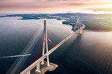 Aerial view of the Russky Bridge from Vladivostok city to Russky Island over the Strait of Eastern Bosphorus. Cable-stayed bridge in Primorsky Krai, Far East, Russia