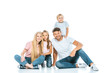 © LIGHTFIELD STUDIOS - happy parents and children in blue denim jeans sitting on white