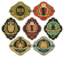 Wall Mural - vector set of ornate beer labels in figured frames with barrel, beer glass, mill, laurel wreath, ear