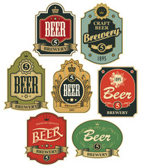 vector set of ornate beer labels in figured frames with ribbons and crowns in retro style.