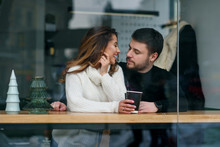 Beautiful Caucasian Couple In Love Drink Coffee At Cafe. Love And Romantic Concept.
