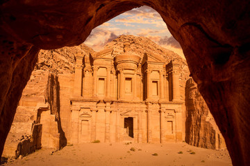 Wall Mural - View of the Monastery (Ad Deir) at sunset framed through cave mouth, Petra, Jordan