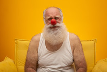 Unhappy Old Man With A Red Nose. All Fools Day. Elderly With Red Nose.