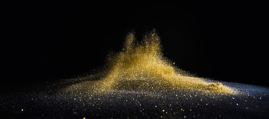 Wall Mural - glitter lights grunge background, gold glitter defocused abstract twinkly gold lights background.