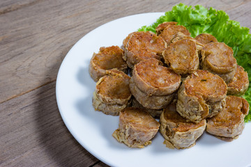  Deep Fried Crab meat roll or Hoi jo on wood  background