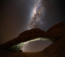 Wall Mural - beautiful view of milky way over rock arch spitzkoppe, namibia. landmark for tourist in namibia.