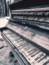 Old Broken Piano In Ruins.