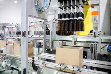 Wall Mural - Close up Beverage bottle sorting machine