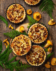 savory chanterelle tarts  on wooden background