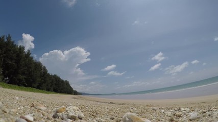 Poster - Time lapse of clouds over beach and sea 