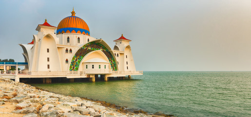 Wall Mural - The Melaka Straits Mosque on water. Panorama