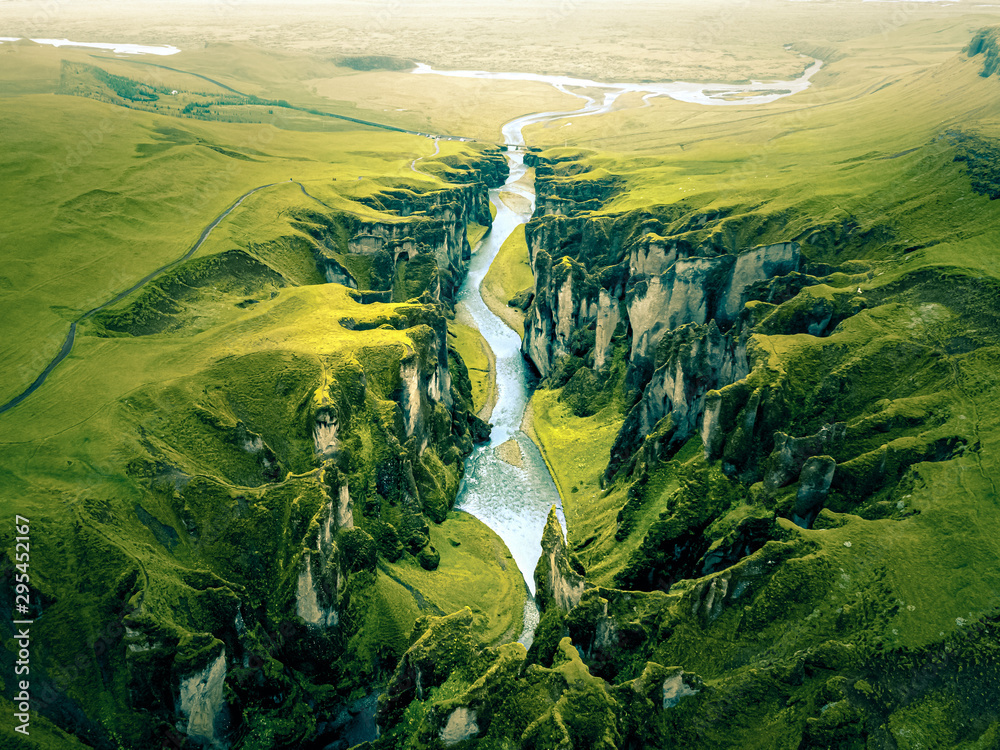 Rugged Landscape of Fjadrargljufur Canyon in Iceland. Aerial shot. - obrazy, fototapety, plakaty 