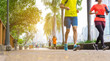 © Patcharanan - Blurred background of people walking and running at park outdoor.