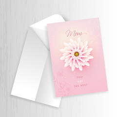 Sticker - Top view of Mother's Day greeting card design with envelope on white wooden texture background.