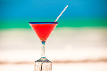 Strawberry margarita on the sandy white beach