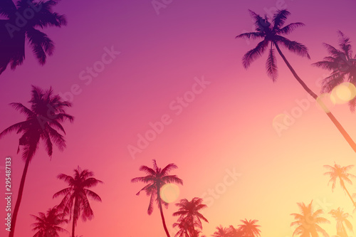 Tropical palm tree with colorful bokeh sun light on sunset sky cloud abstract...