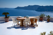 Romantic Mediterraen Vacation Lunch On A Rooftop Over The Sea In Santorini