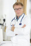 Fototapeta  - a mature handsome doctor man