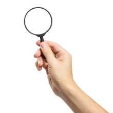 Hand Holding A Magnifying Glass, Isolated On White Background