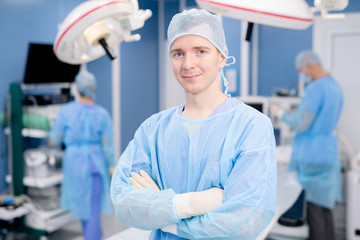 Aufkleber - Successful professional in uniform of surgeon crossing his arms on chest