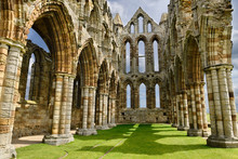 Chancel And Wall Of The Sanctuary Of Gothic Ruins Of Whitby Abbey Church In Sunshine North York Moors National Park England