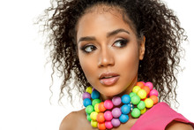 Beauty Black Skin Woman Fashion African Ethnic Female Face Portrait. Young Girl Model With Afro And Extraordinary Brightly Colored Rainbow Beads Around The Neck