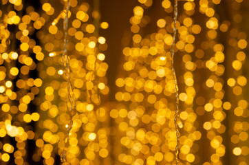 abstract photo of light burst among trees and glitter bokeh lights