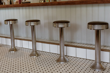 Close-up of counter stools at a classic New England diner in a small town in Vermont.