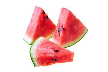 Group of slices of fresh watermelon in form of triangle with red ripe juicy pulp and seeds isolated on white background without shadow