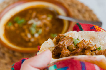 Wall Mural - Tortilla filled with birria, tacos de birria are delicious food from Mexico