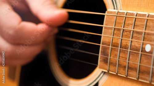 Cuadros en Lienzo Detail of man playing an acoustic guitar. 16:9 image