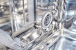 a dishwasher machine filter close up. Domestic kitchen appliance parts