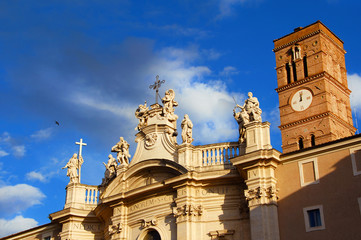 Wall Mural - Holy Cross in Jerusalem church, wonderful late baroque masterpiece with marble statues of saints, turns to gold at sunset, in Rome (18th century)