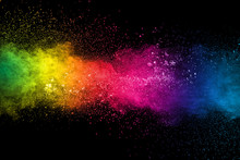Colorful Background Of Pastel Powder Explosion.Multi Colored Dust Splash On Black Background.Painted Holi.