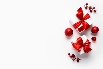 christmas and new year holiday background. xmas greeting card. christmas red ribbon gifts and orname