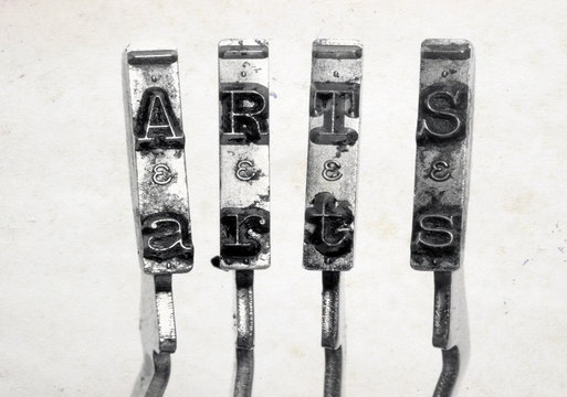 old typewriter hammers and the word ARTS toned