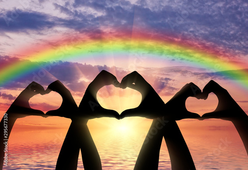 Fotomural Altruism. Three pairs of hands show a heart symbol